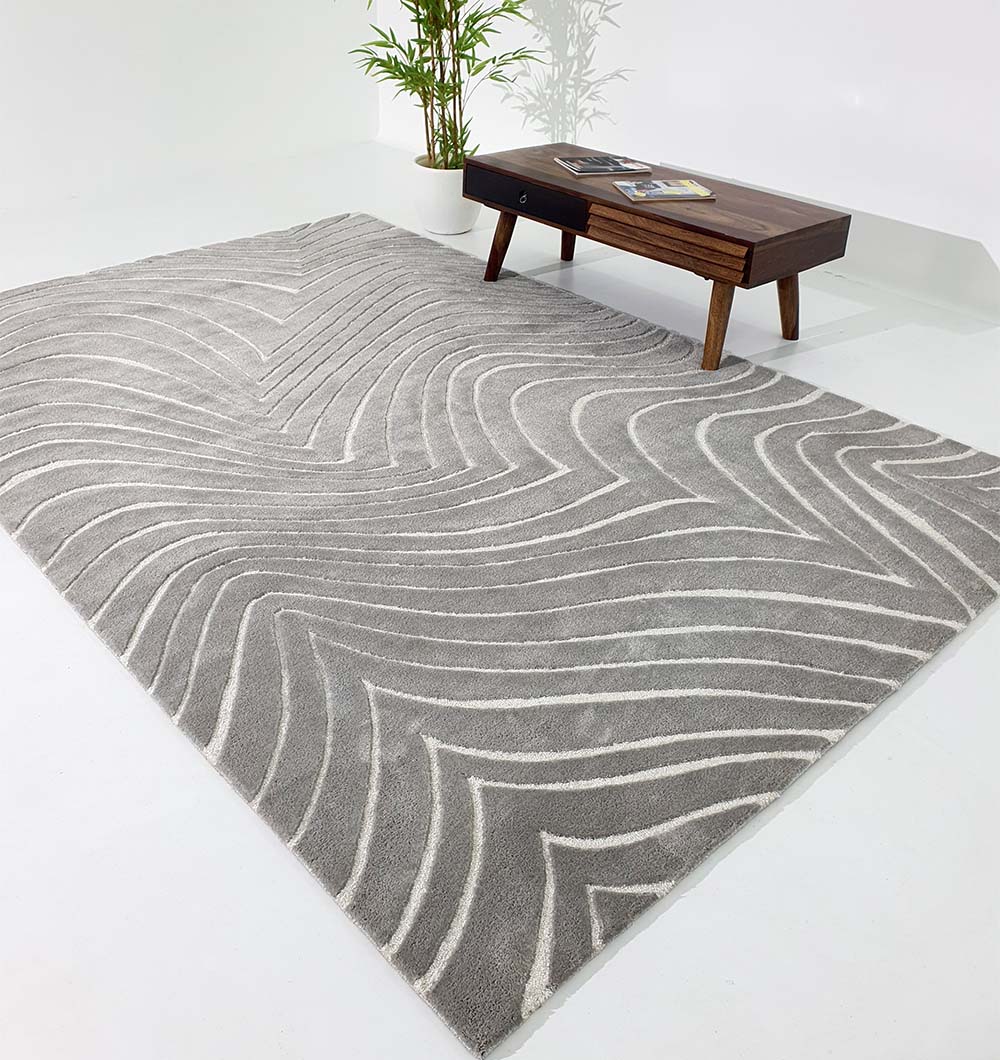 Multi-color rug in a home setting, showcasing the dimensional geometric pattern and multi-hued look.