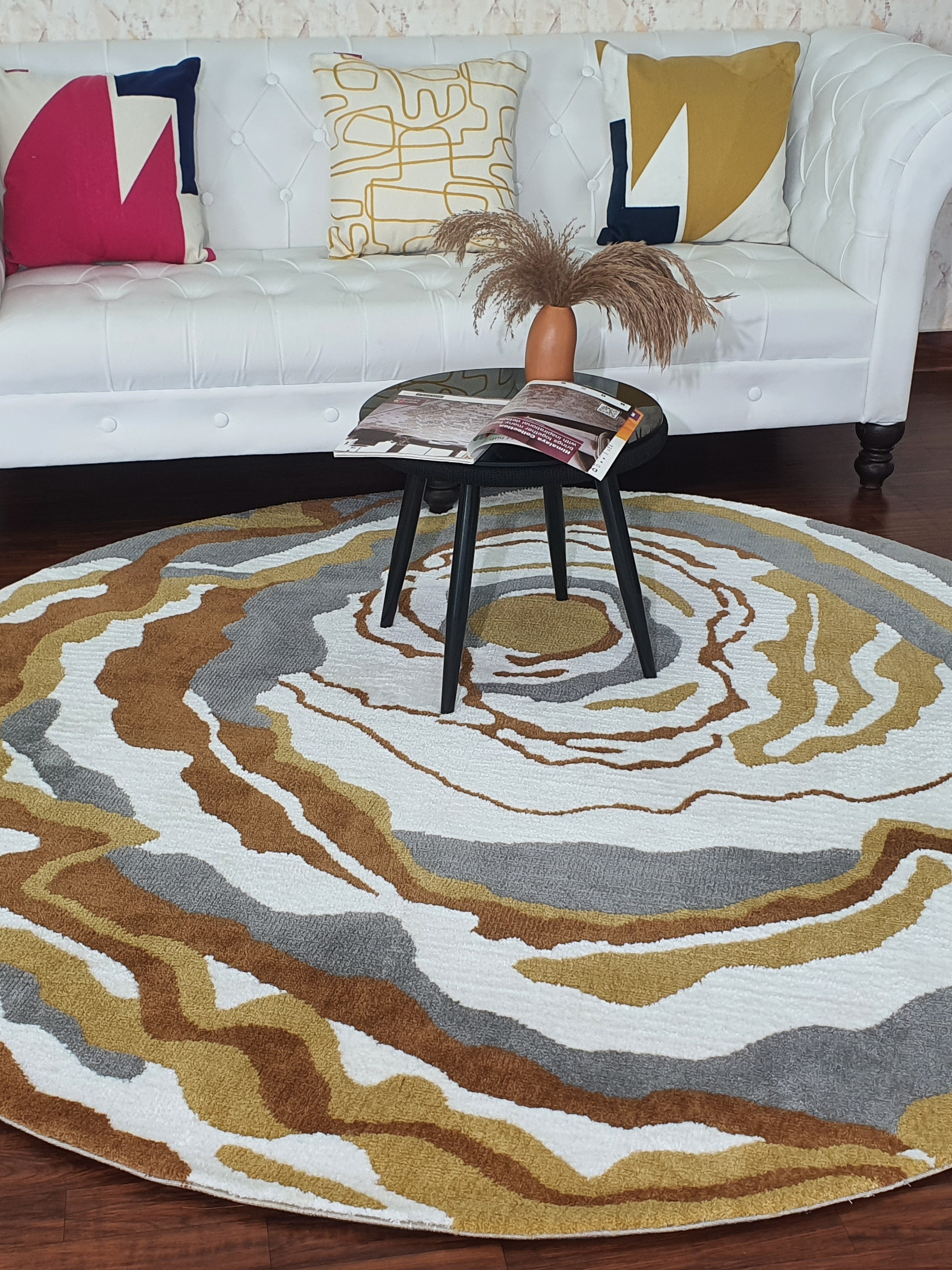 Exquisite multi-color round carpet with artistic charm, adding vibrant elegance to your living room decor