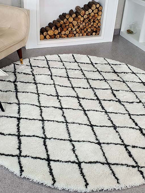 Indulge in the luxurious softness of our Cream Shaggy Rugs, perfect for home decor