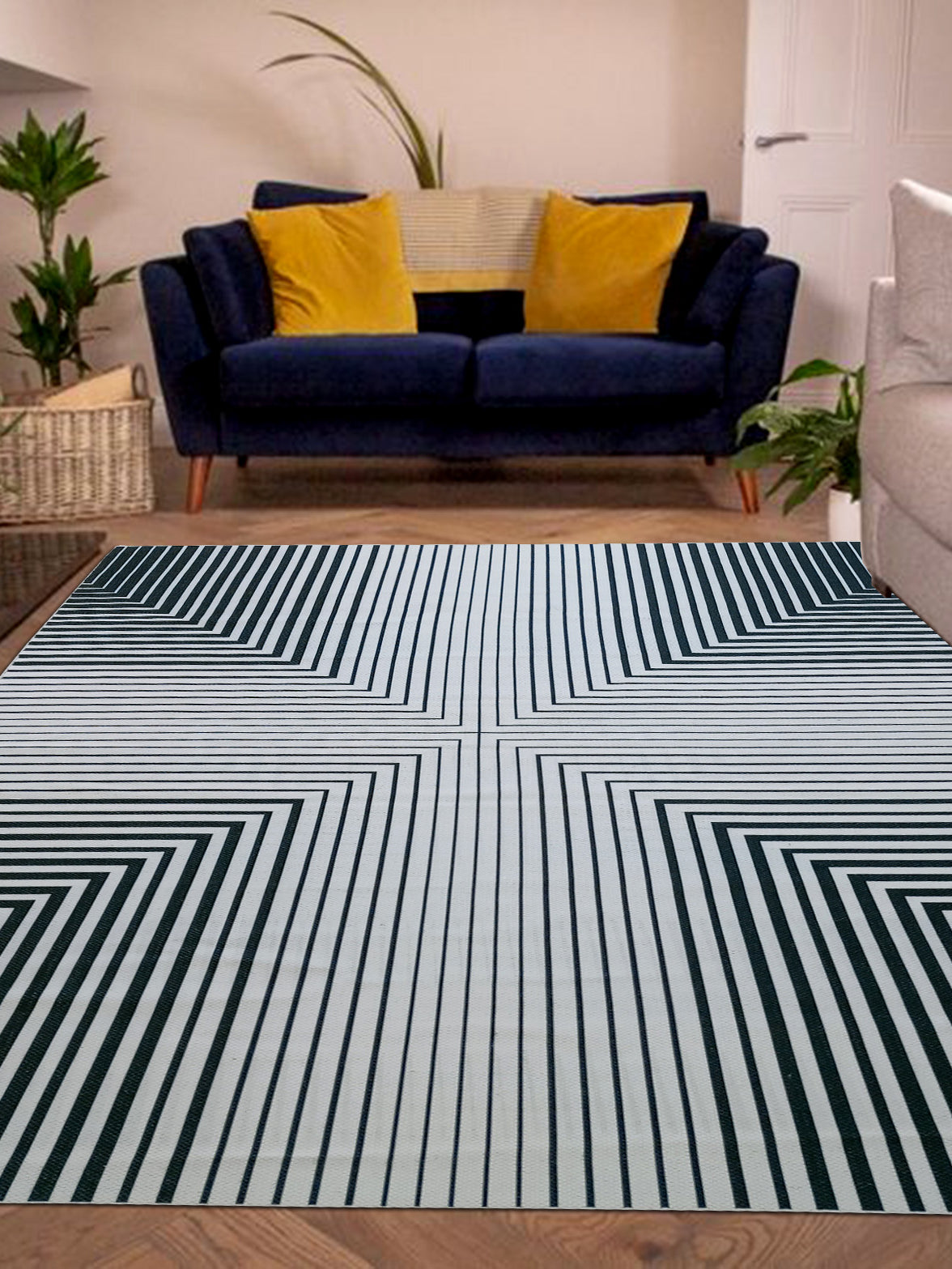 Introducing our Stripe Pattern Black Color Printed Rug, designed to elevate the style of any drawing room