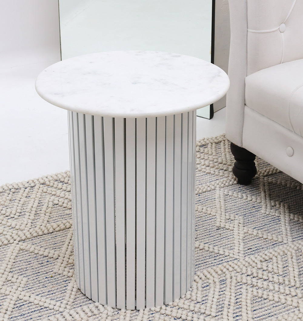 Angled view of the premium marble table, serving as a sophisticated centerpiece in a modern interior setting.