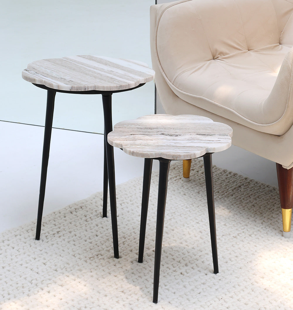 CloudForm nesting marble tables with an irregular shape, combining contemporary design and practical functionality.
