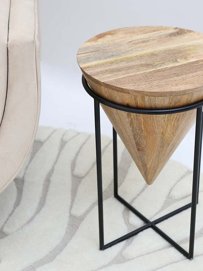 Contemporary handmade side table in natural and black powder finish, completing the home décor aesthetic.