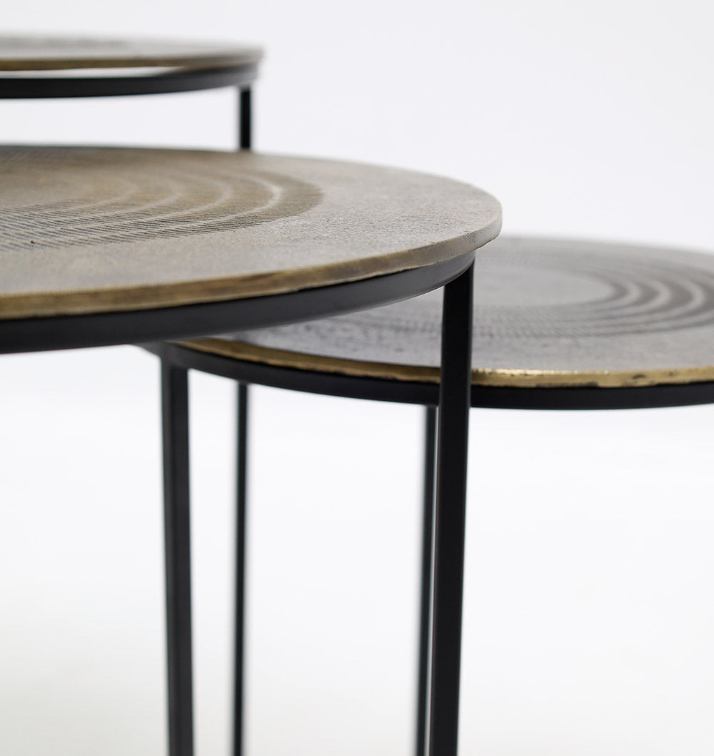 Side profile of the nested tables, highlighting the minimalist design and sturdy construction for durability.