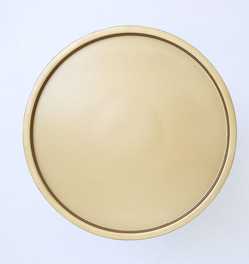 Top-down view of the brass antique surface, highlighting the artistic design and durable iron construction.