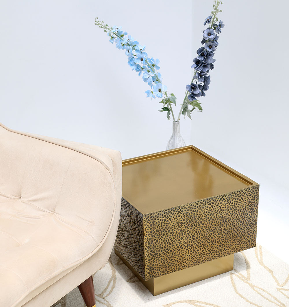 Perspective shot highlighting the elegant textured leopard-inspired pattern next to small decorative items.