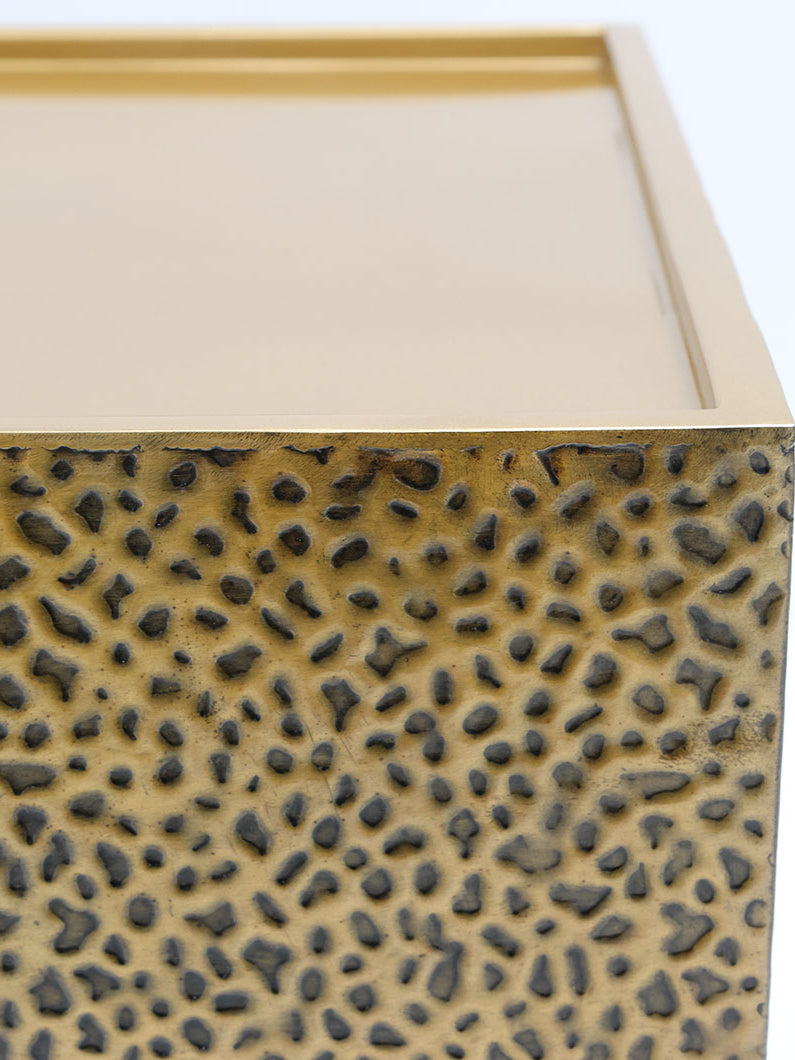 GH-087 showcases a bold rectangle silhouette with shimmering gold detail and sculpted texture.