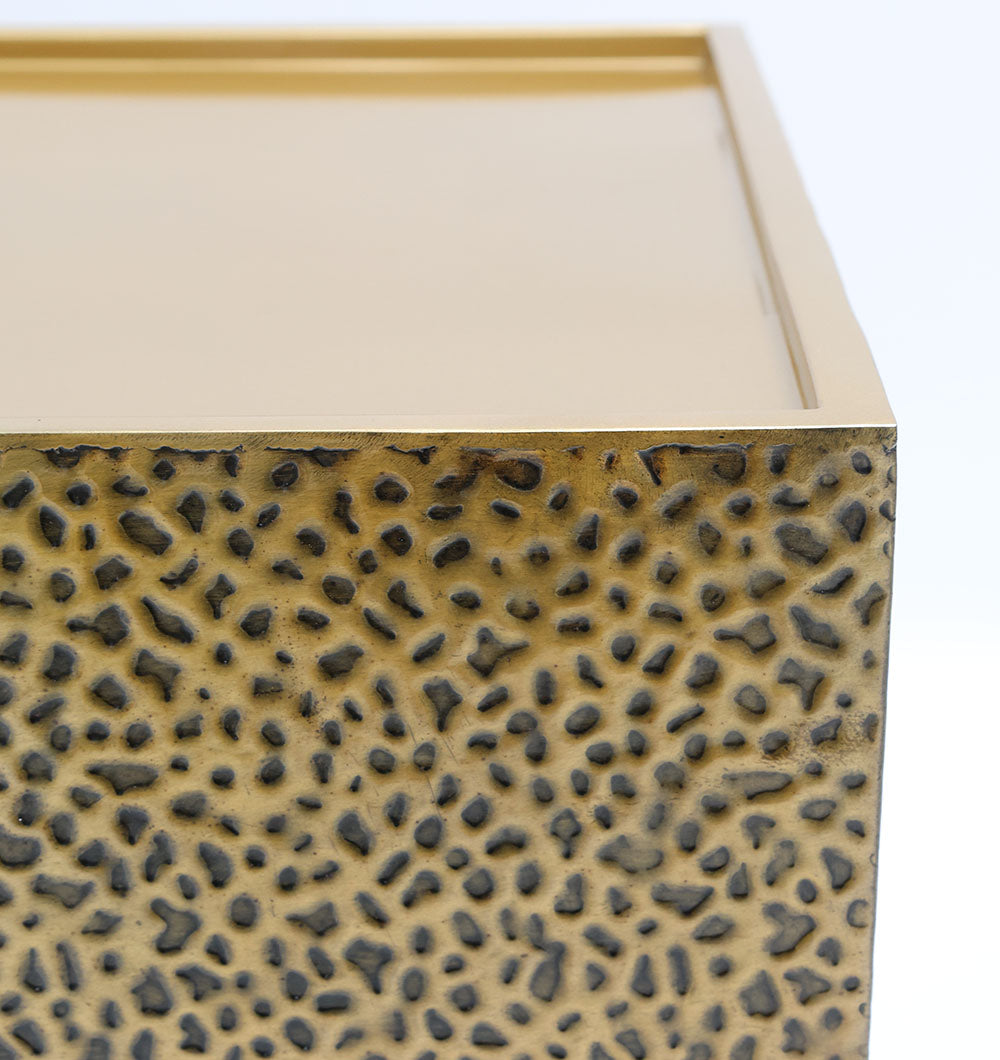 GH-087 showcases a bold rectangle silhouette with shimmering gold detail and sculpted texture.