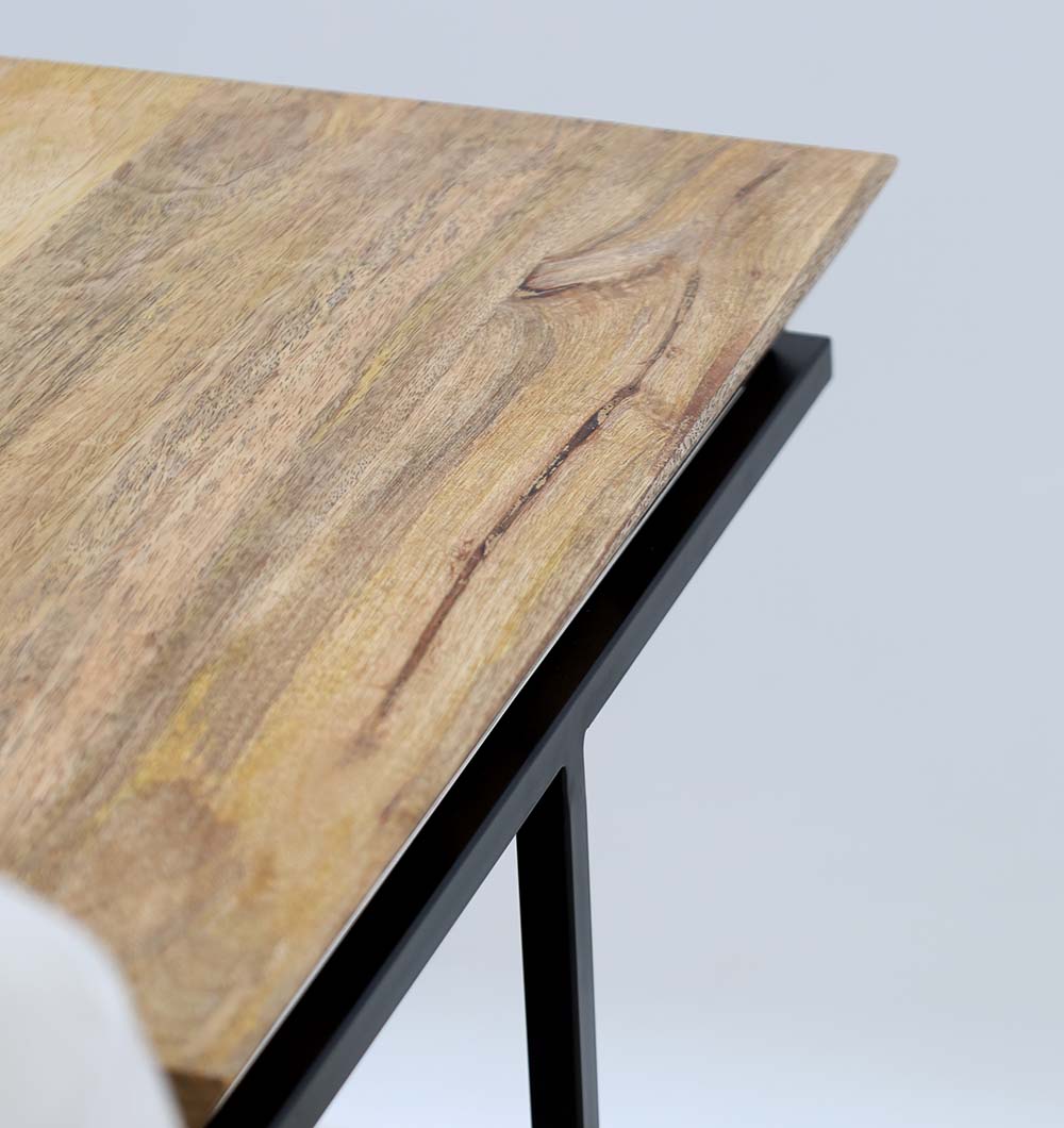 Accent table featuring sculptural cone design in wood and metal.