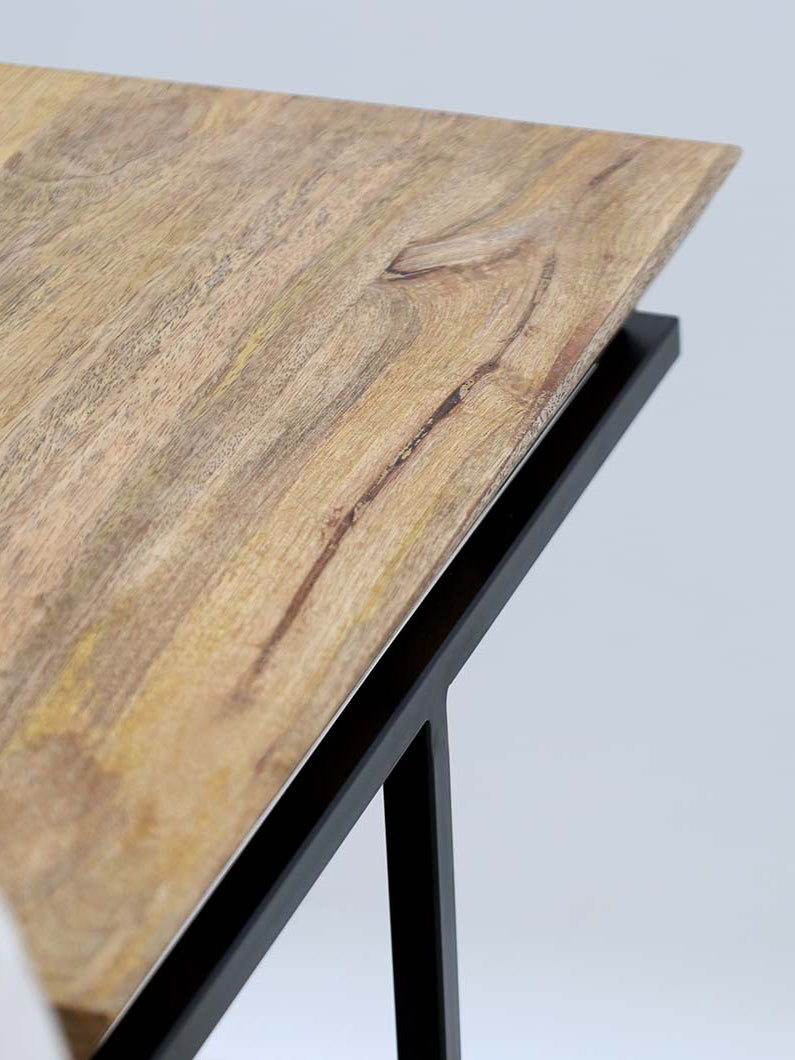 Accent table featuring sculptural cone design in wood and metal.