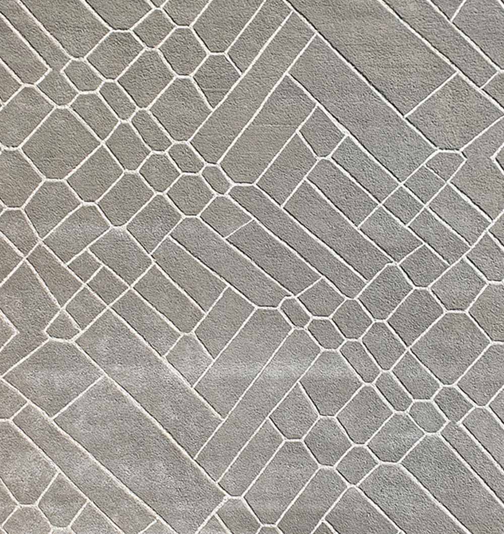 Detailed shot emphasizing the quality workmanship and hand-finished surface of the tufted construction.