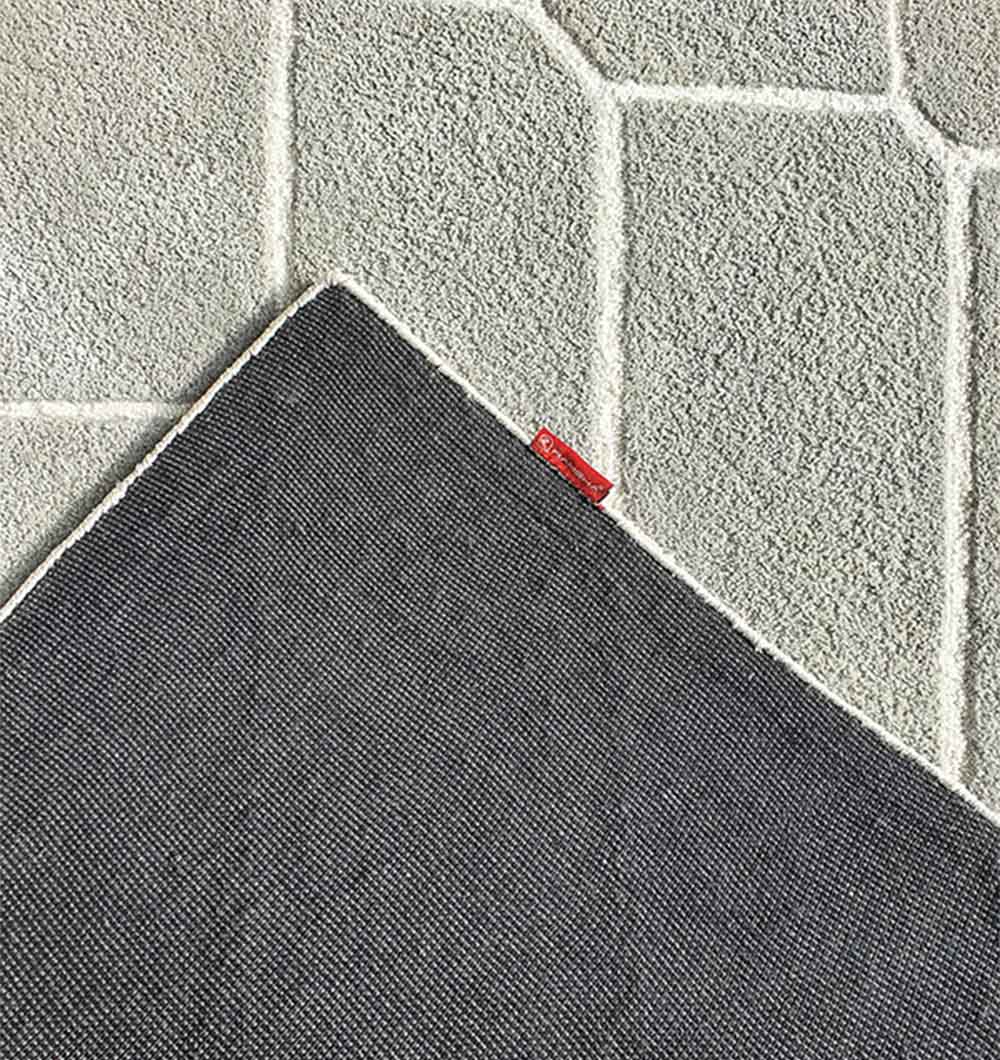 Backside of the rectangular rug, confirming the secure tufting and thick backing for long-term use.