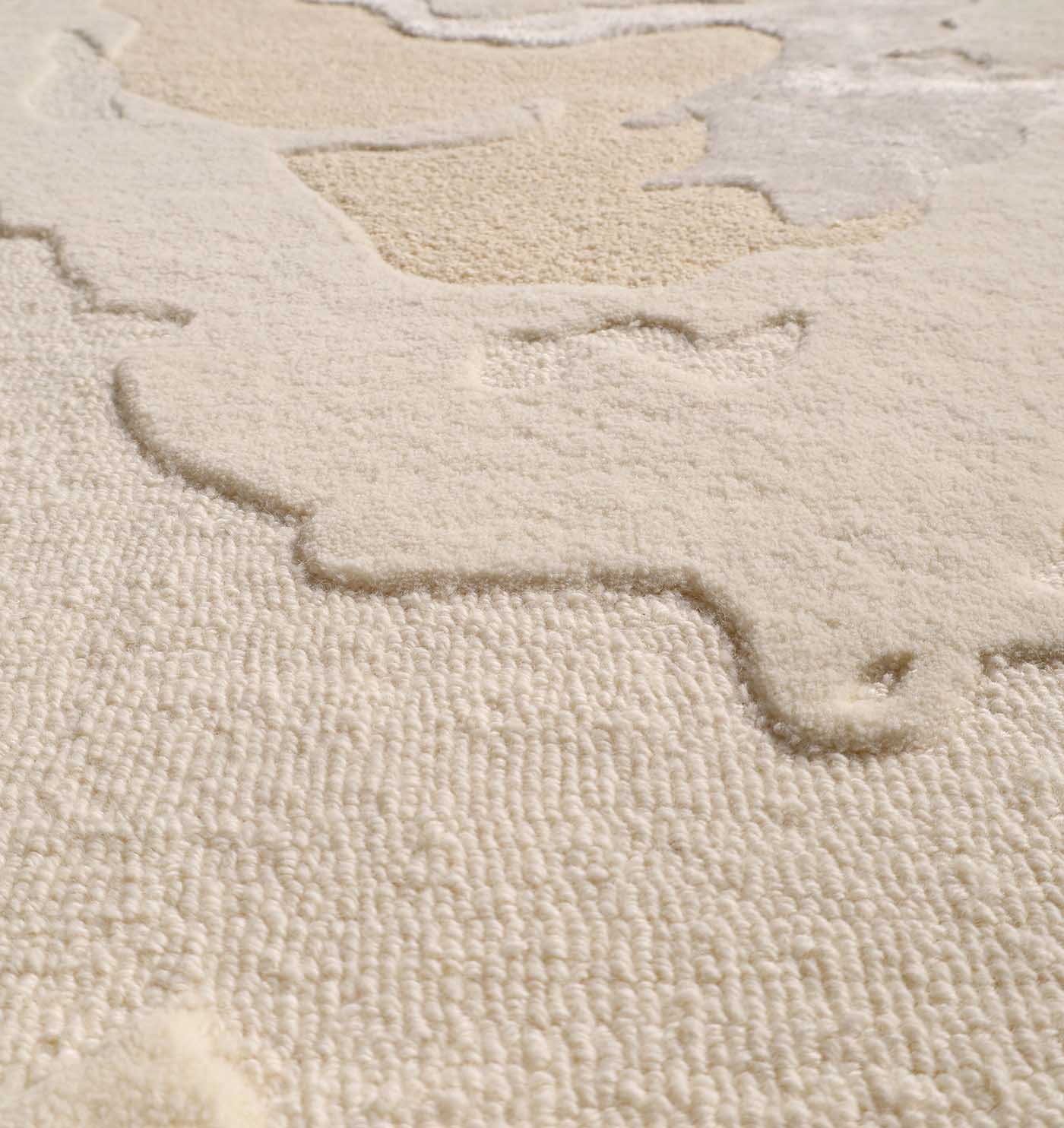 Close-up detailing the multi-color design and the soft and durable finish of the $70%$ wool, $10%$ viscose, $20%$ cotton blend.