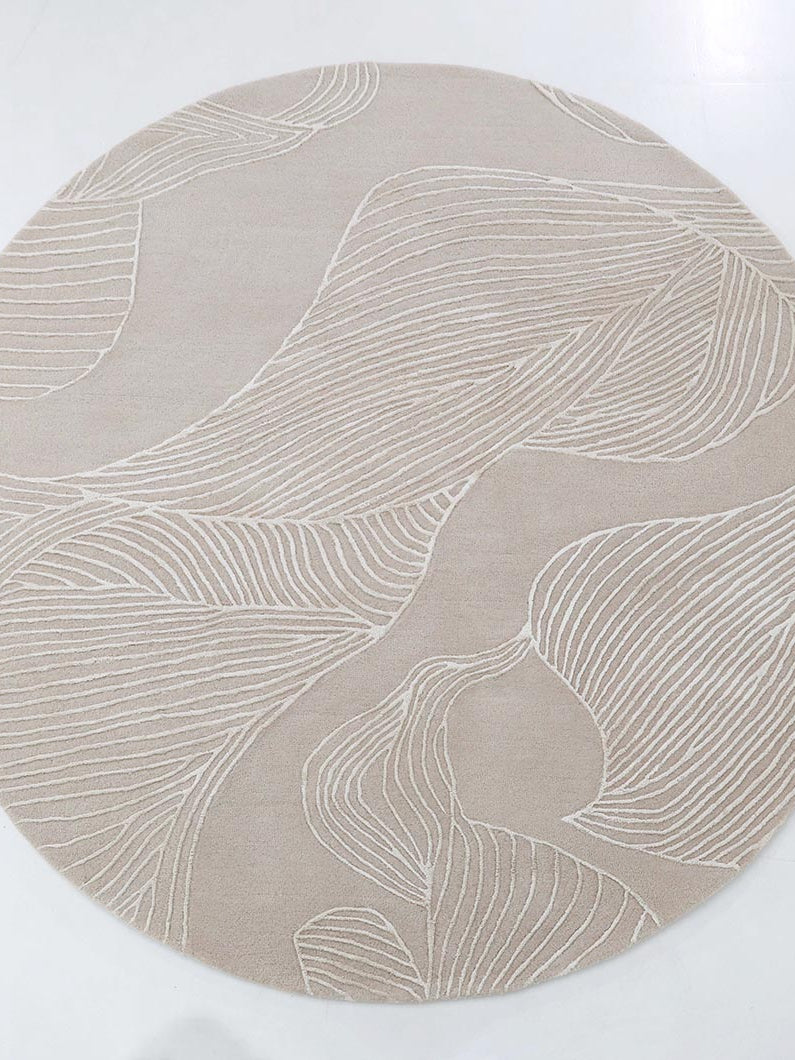 Handmade area rug in a striking beige hue, bringing a bold statement and sophisticated design to the living space.