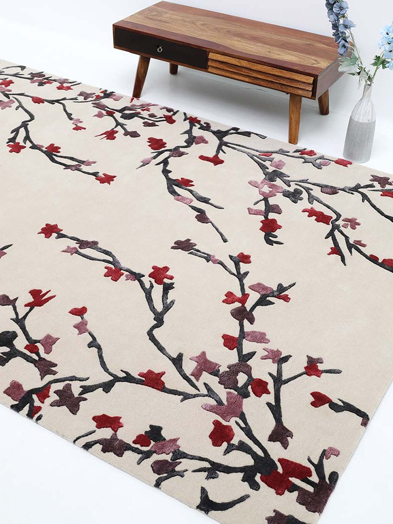 Rectangle multi color rug placed in a living space, adding depth and warmth with its rich, harmonious hues.