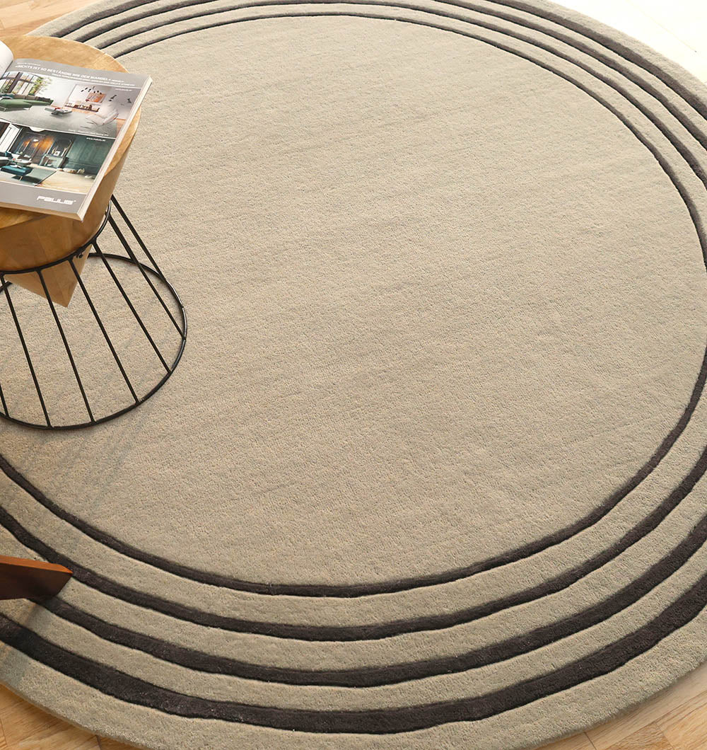 Round area rug showcasing lasting comfort and durable texture, complementing modern decor styles in the room.