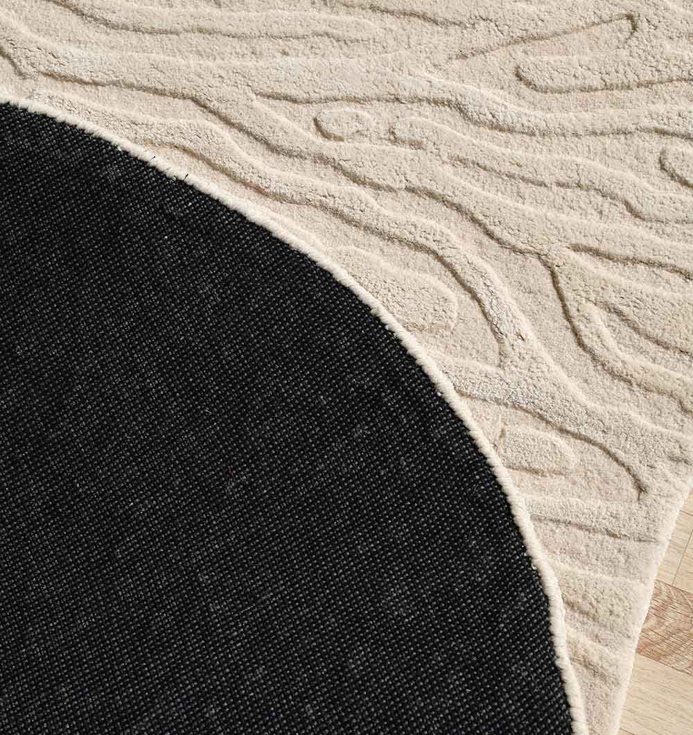 Backside of the natural white shaped rug, showing the robust foundation for lasting quality.