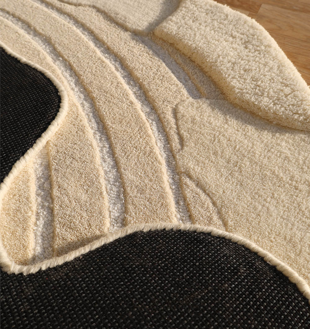 Close-up focusing on the hand-tufted weave, demonstrating the meticulous attention to detail and durable construction.