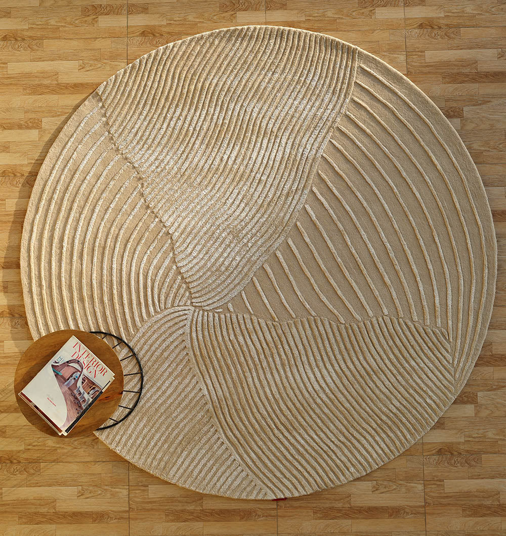 Beige textured round handmade area rug, showcasing superior quality and aesthetic sophistication with luxurious texture.