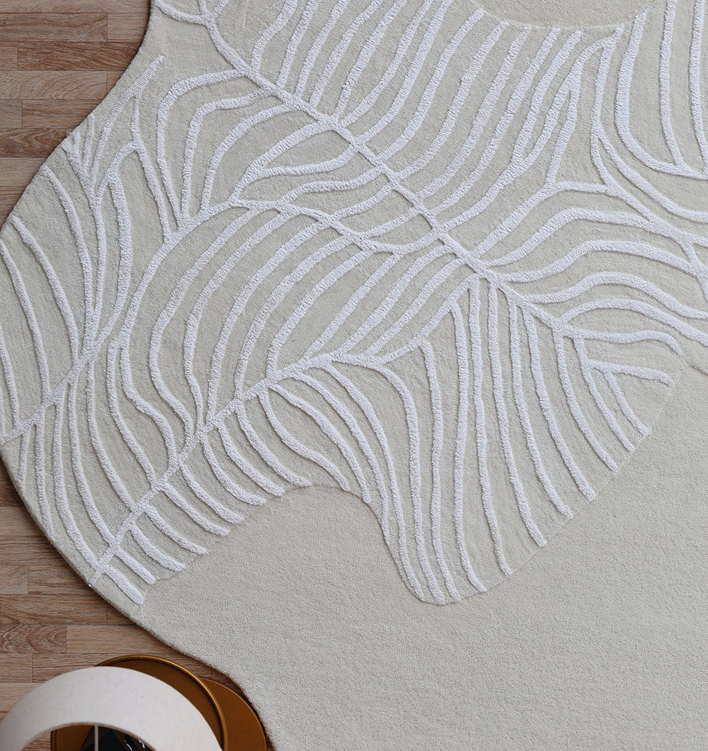 Side view of the irregular shaped rug, showing the unique character and superior quality of the handmade construction.