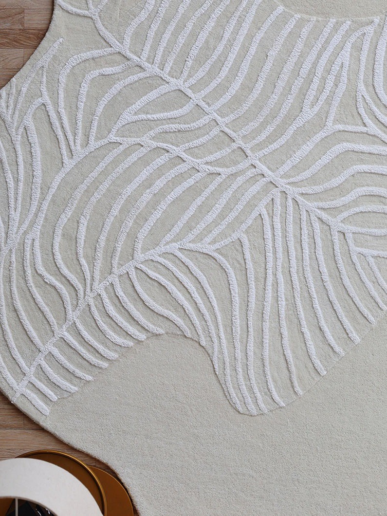 Side view of the irregular shaped rug, showing the unique character and superior quality of the handmade construction.