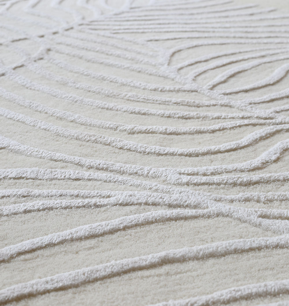 Close-up detailing the luxurious texture underfoot and the excellent resilience of the premium wool, viscose, and cotton fibers.