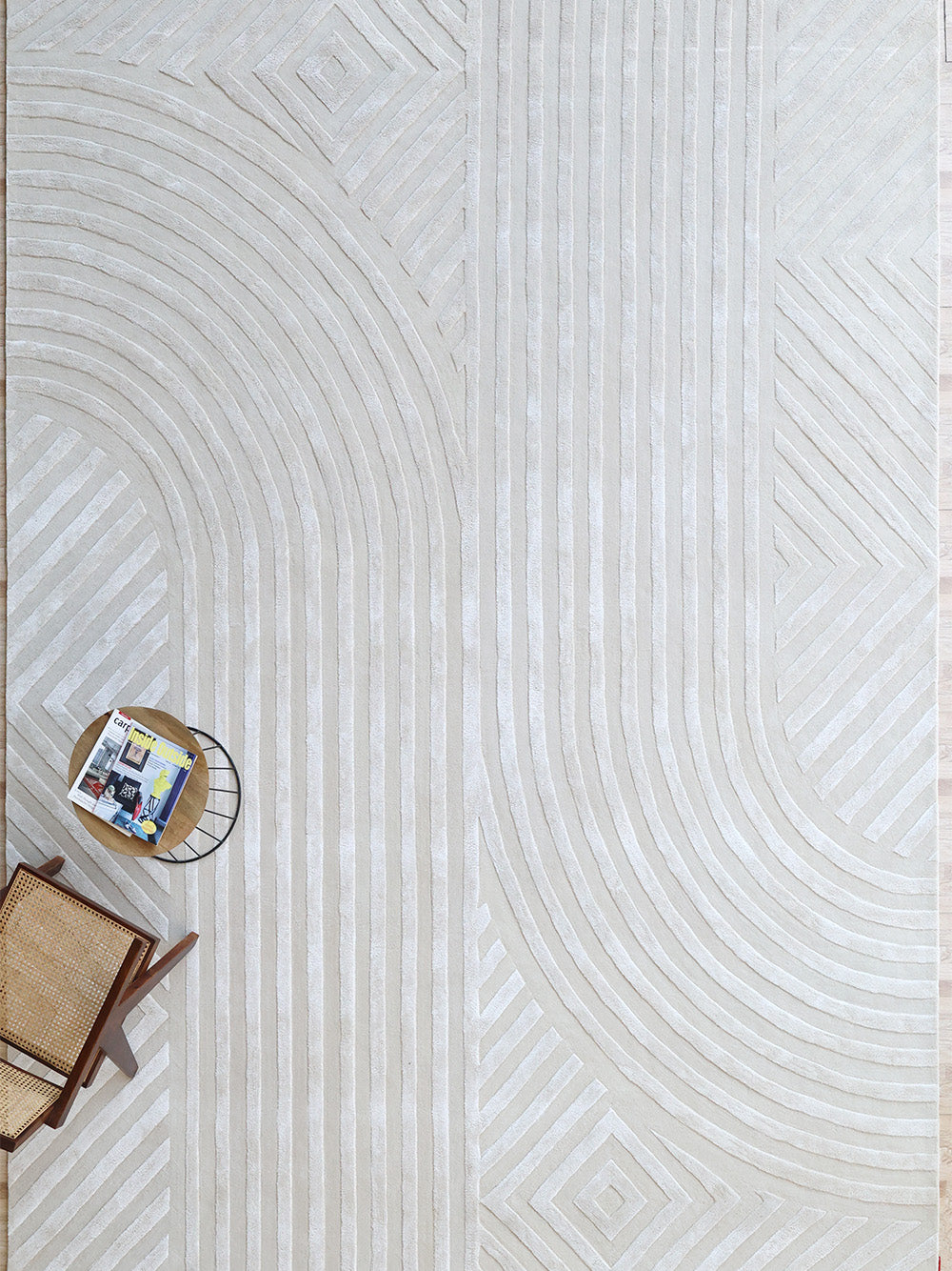 Modern linear pattern handmade area rug in natural white, displaying superior quality and aesthetic sophistication.
