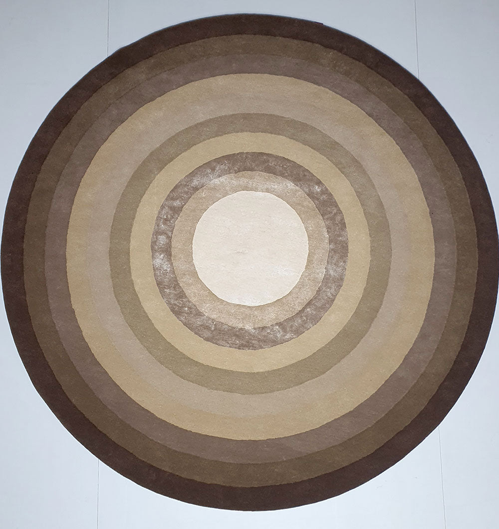 Main image of the multi-color hand-tufted round rug, featuring a soft-touch pile from the 50% wool viscose blend.