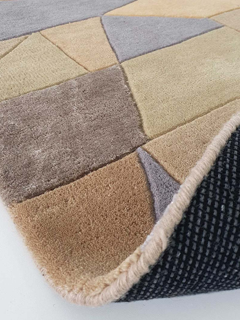 Backside view of the round carpet, confirming the durable backing and solid weave construction of the hand-tufted material.