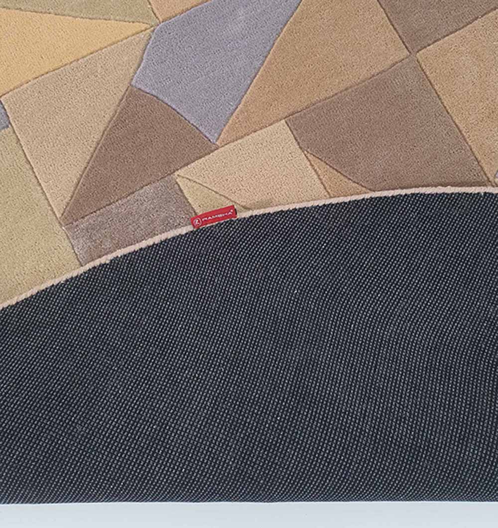 Reverse side of the multi-color carpet, showing the insulating fiber structure of the 80% wool and 20% cotton blend.