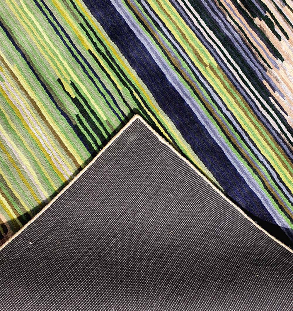 Backside of the multi-color rug, confirming the sturdy secondary backing and handmade construction quality.