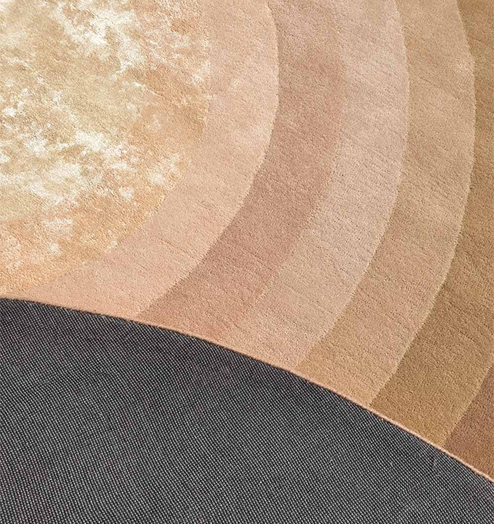 Backside of the round hand-tufted rug, confirming the finely crafted construction and quality backing.