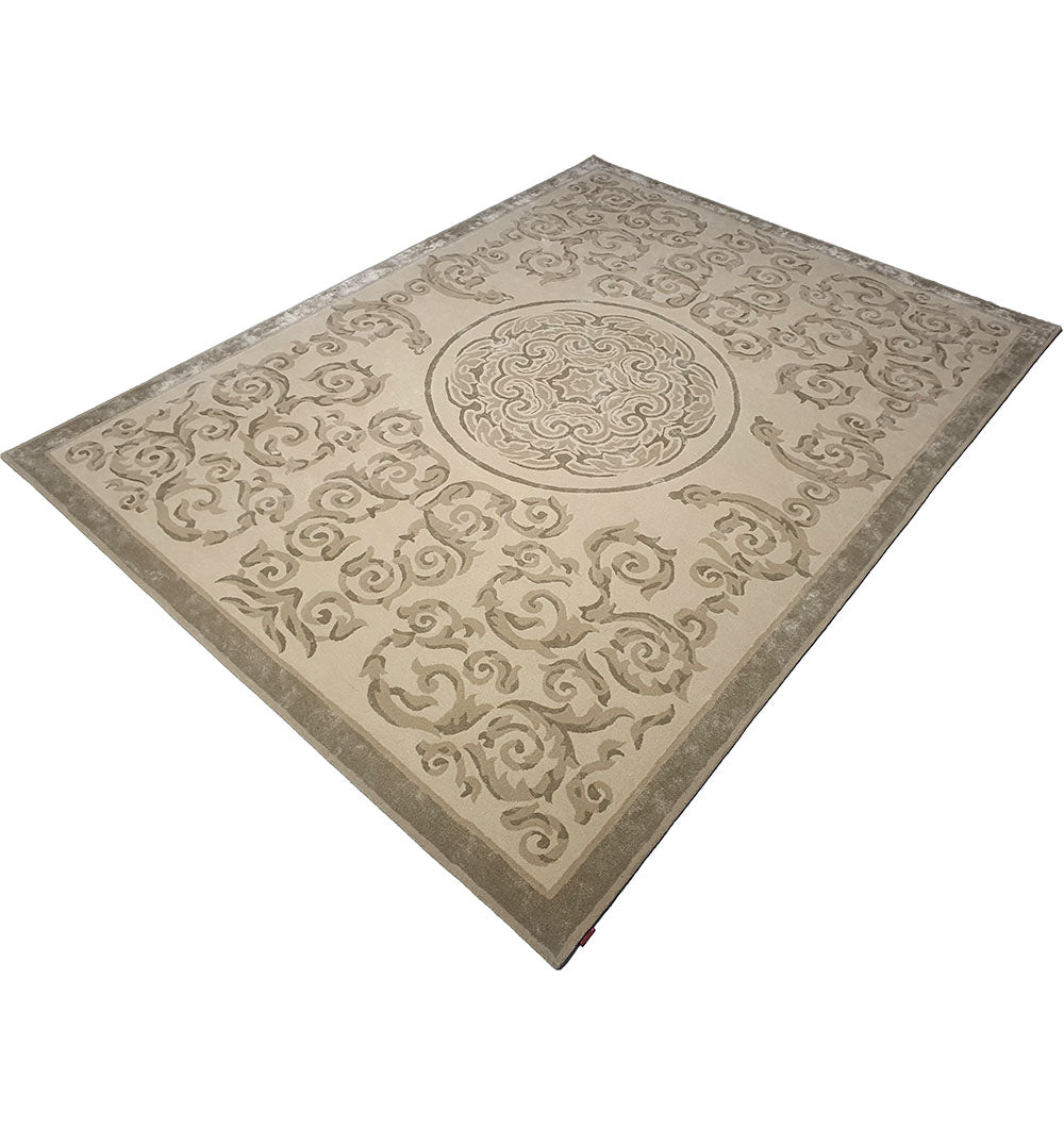 Angled view of the rectangular area rug's finished edge, highlighting the precise craftsmanship of the hand-tufted technique.