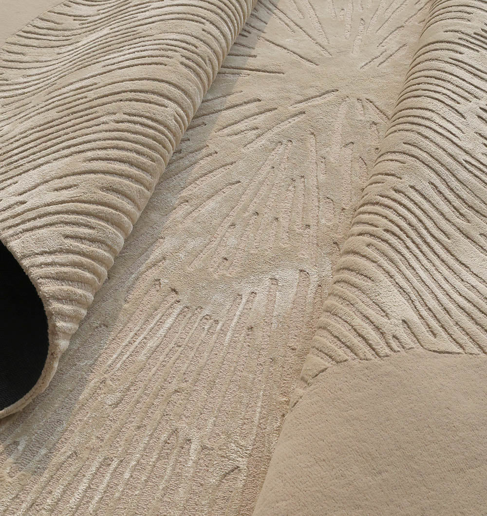 Close-up detailing the luxurious texture of the multi-color rug, made from the wool, viscose, and cotton blend.