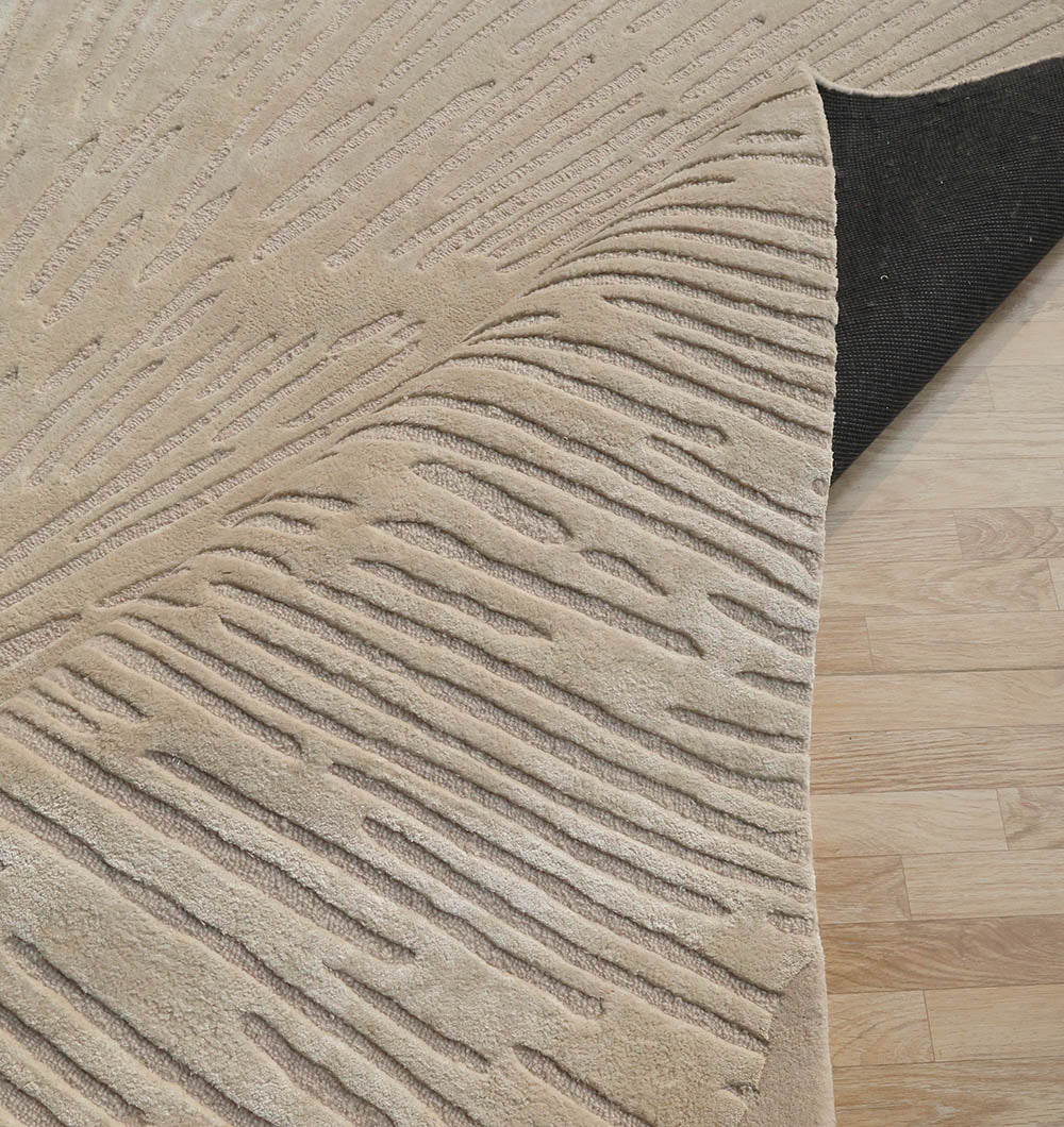 Detailed shot highlighting the unique addition and high-quality fibers used in the handmade rectangular carpet.