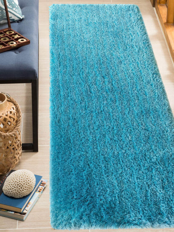 Elevate your home decor with our Aqua Soft Shaggy Rug, handmade with premium quality cotton and polyester