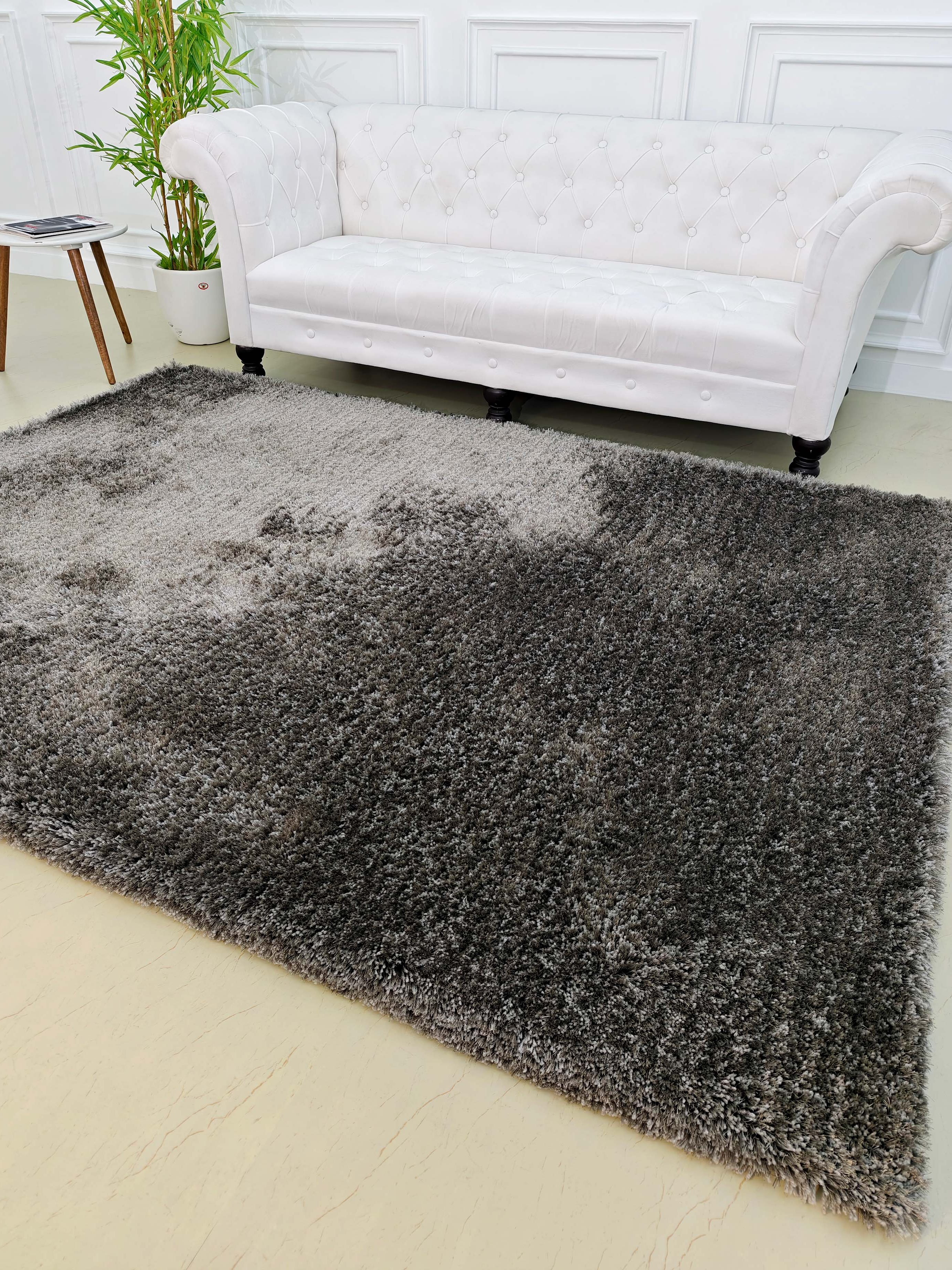 Sink into Luxury: Our Round Grey Shaggy Rug Brings Unparalleled Comfort to Your Living Room or Bedroom Decor