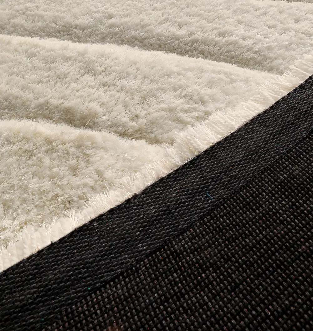 Backside of the rectangular luxury shaggy rug, confirming the robust and durable construction for longevity.