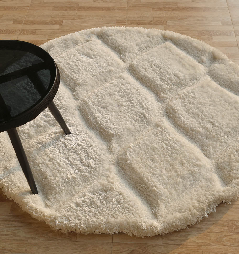 Side angle of the modern soft round shaggy rug, designed to seamlessly blend into any room with chic aesthetic.