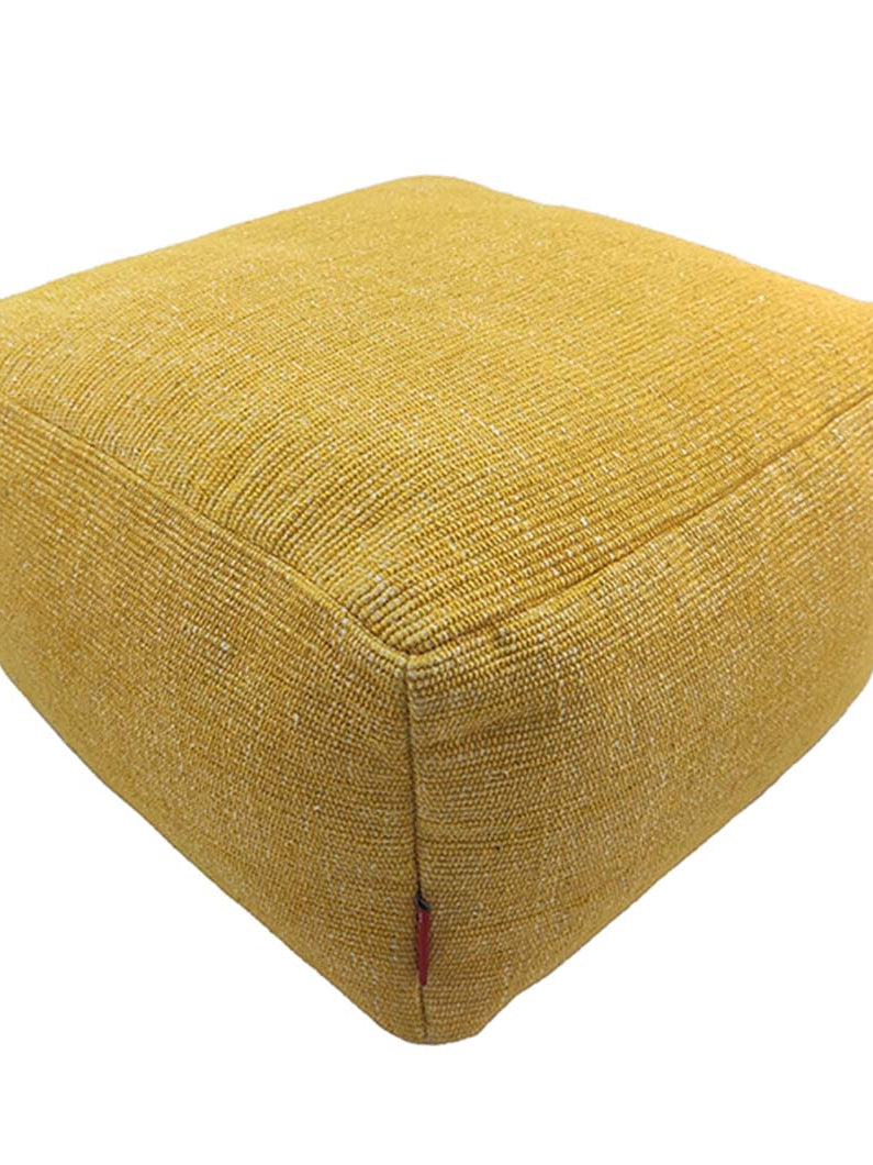 Handmade yellow cotton pouf with soft texture and durable design, perfect for bright and cozy interiors.