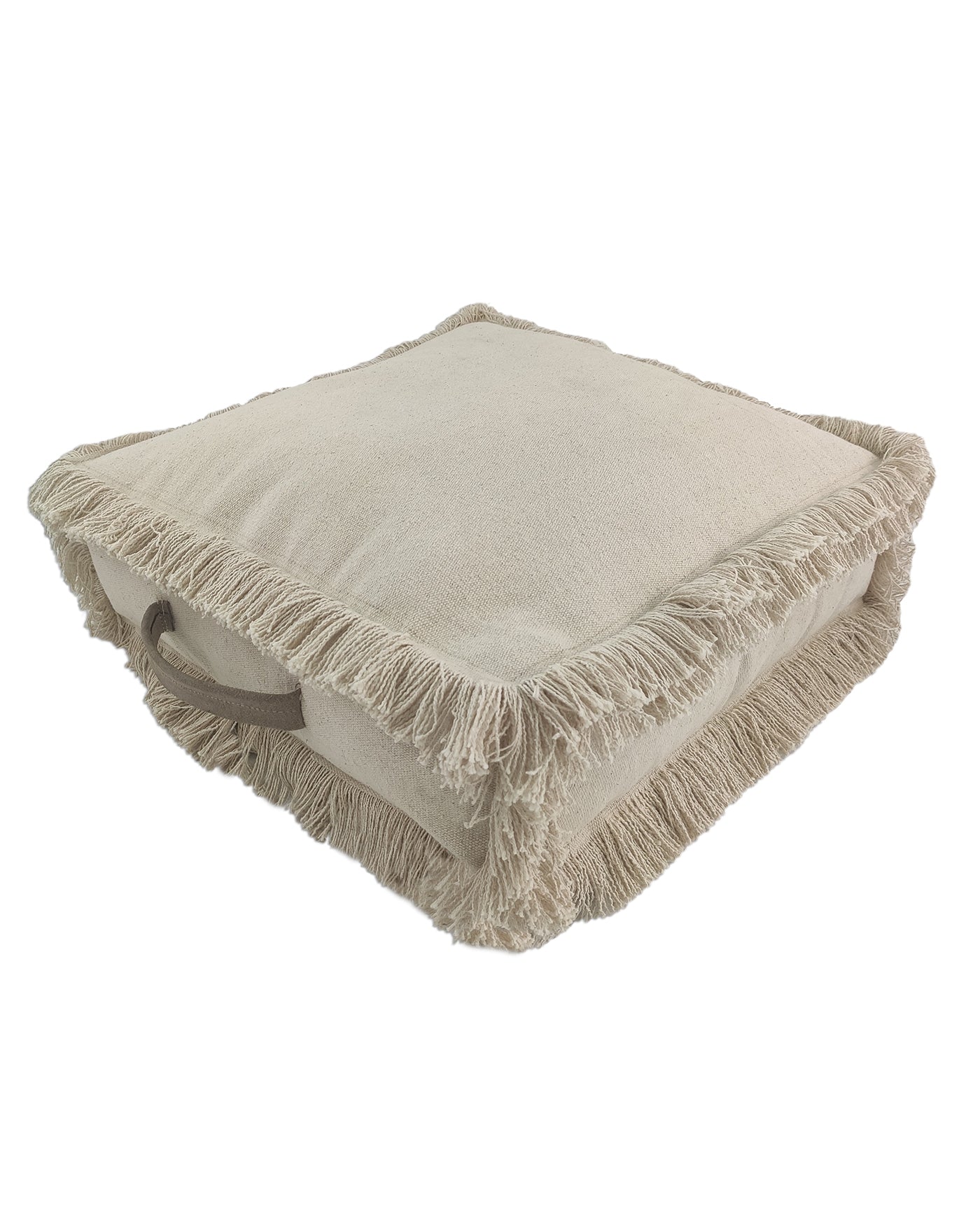 Light beige cotton pouf with leather handle placed in a modern living room setting, adding a touch of warmth and style.