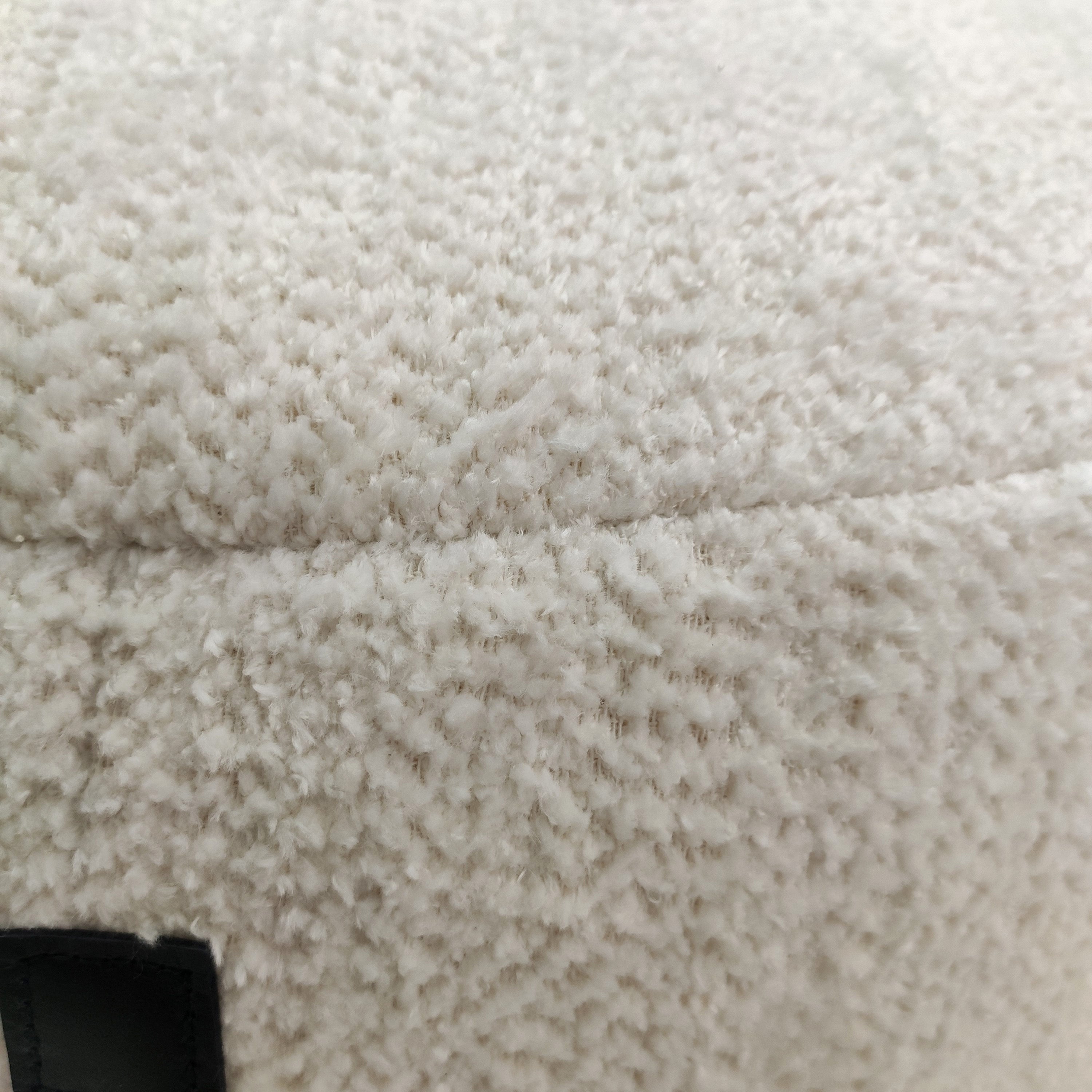 Detailed shot highlighting the soft cotton fabric and high-quality craftsmanship of the White Cotton Pouf PF-095.