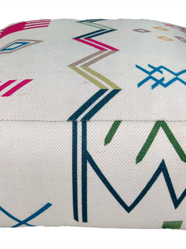 Handmade Multi Colored Polyester Pouf PF-103 placed in a modern living room setting, showcasing its vibrant striped design.