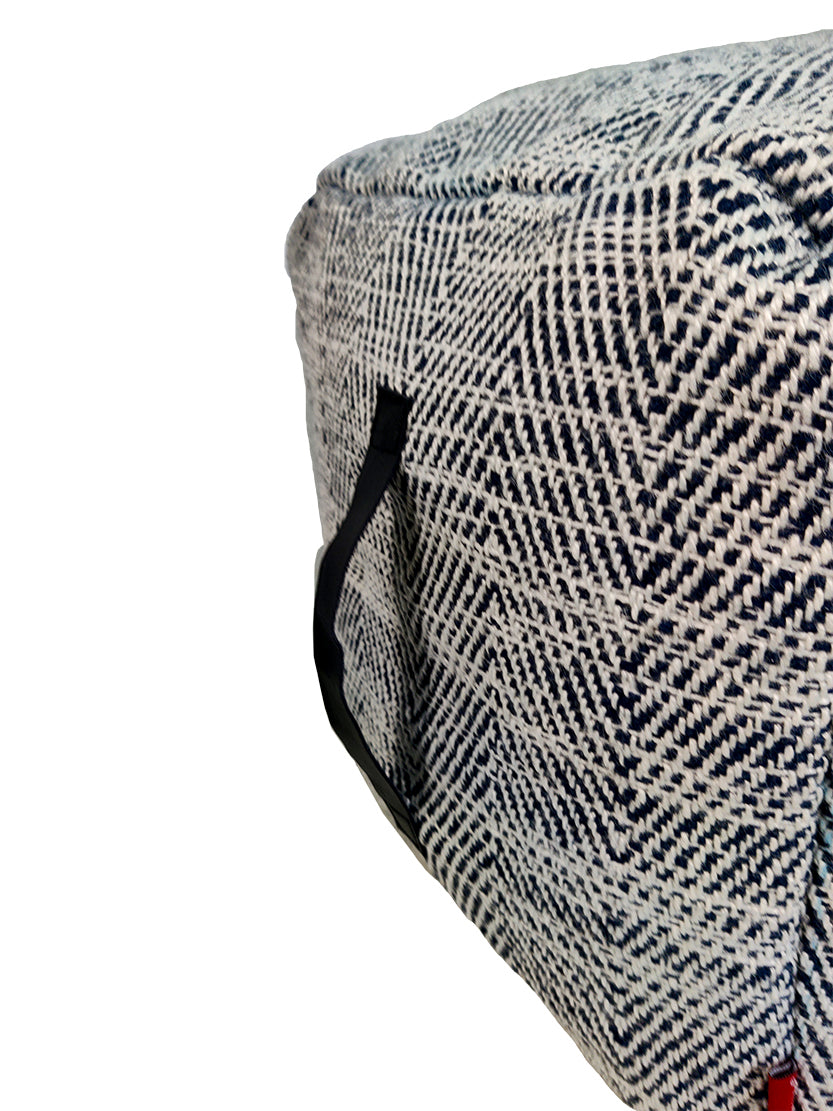 Close-up view of Blue Polyester Pouf PF-104 showing detailed woven texture and craftsmanship of the striped fabric pattern.