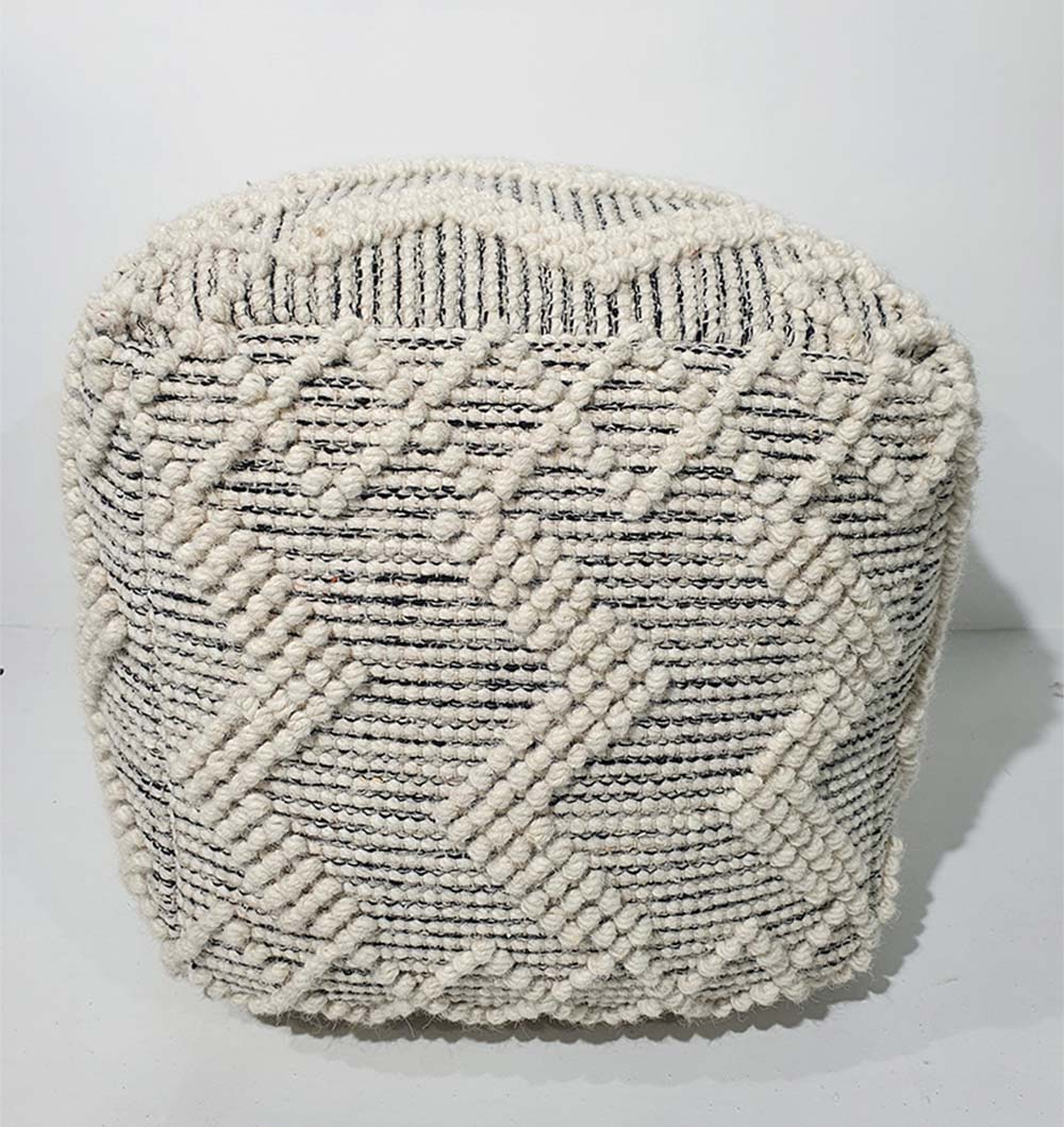 Stylish handmade wool pouf PF-137 featuring a textured natural fabric design for contemporary living spaces
