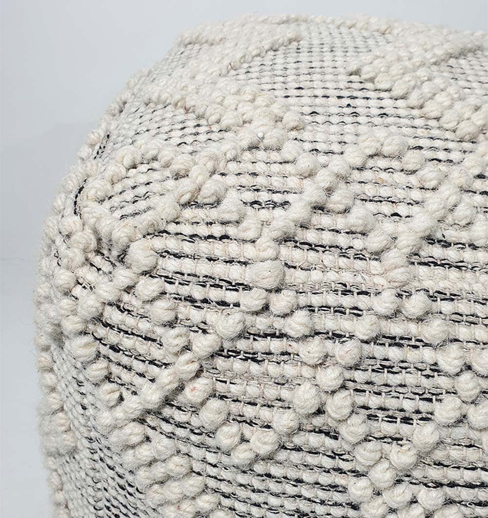 Close-up view of handmade wool and cotton pouf PF-137 showing detailed woven texture and natural fabric finish