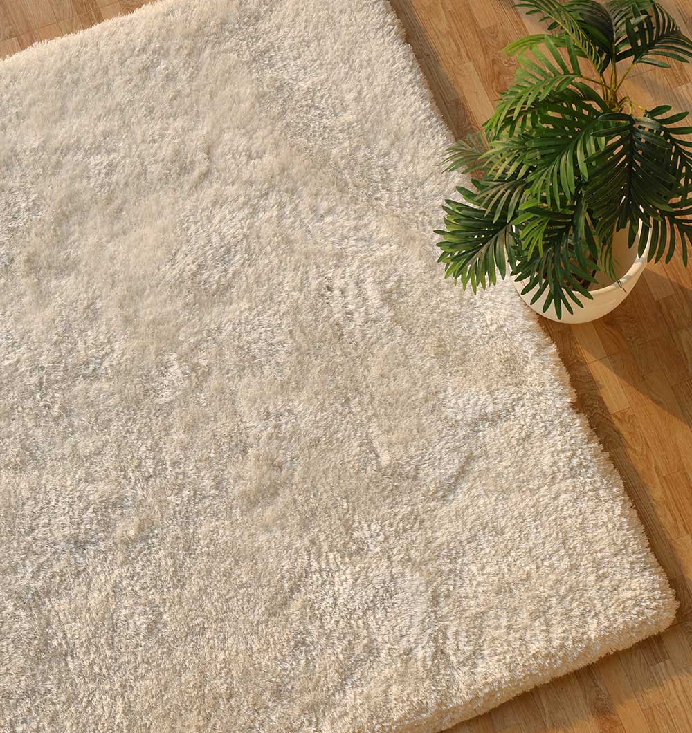 Detailed shot of the durable shaggy pile in the context of the room, emphasizing warmth and long-lasting comfort.