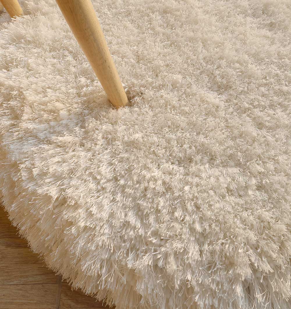 Close-up detailing the superior softness and thick pile of the shaggy $80% polyester and $20% cotton blend.