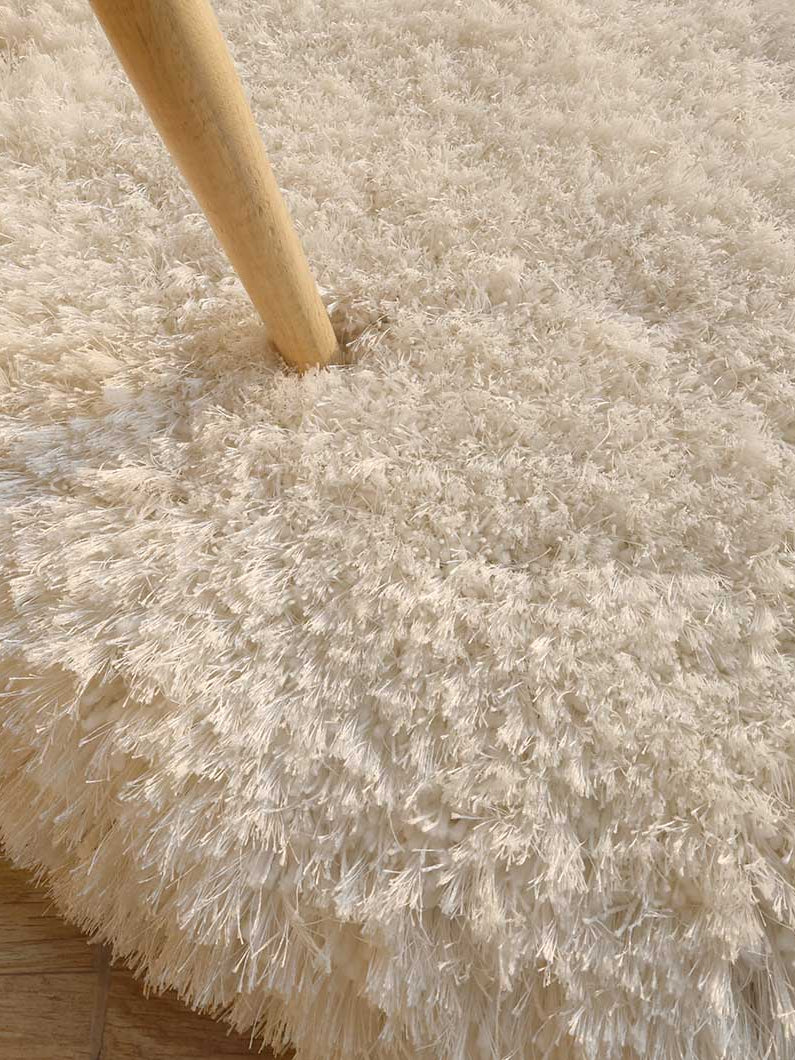 Close-up detailing the superior softness and thick pile of the shaggy $80% polyester and $20% cotton blend.