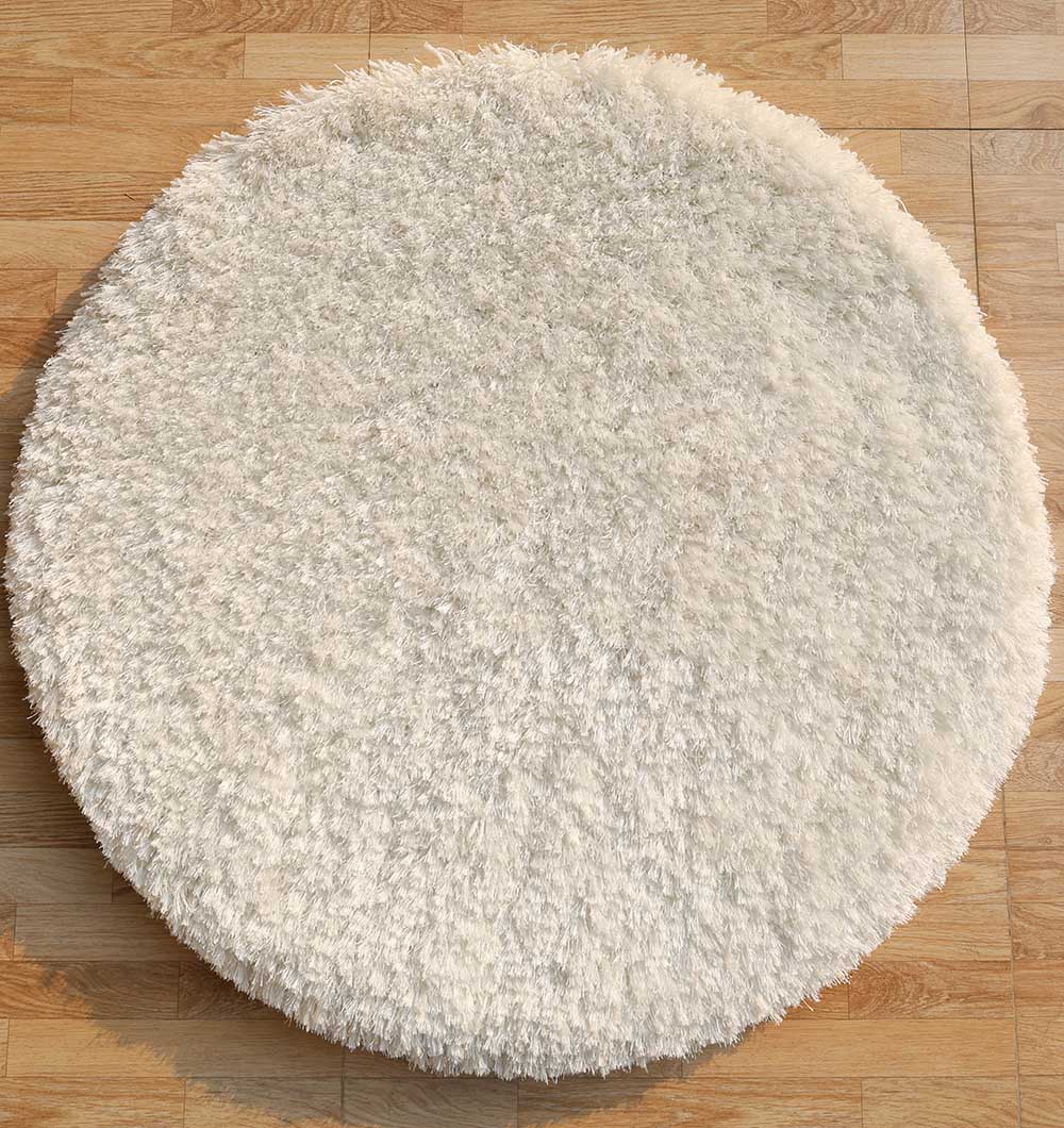 Handmade soft and comfort shaggy rug in round shape, adding plush texture and warmth to any room.
